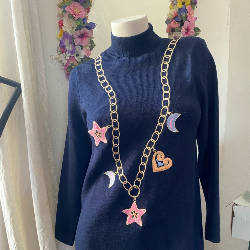 St.John Navy blue sweater with necklace charms